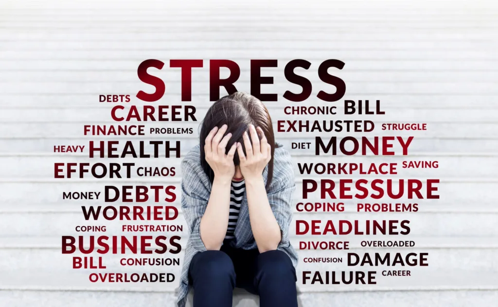A woman overwhelmed by stress. IBS dietitian in California and Europe